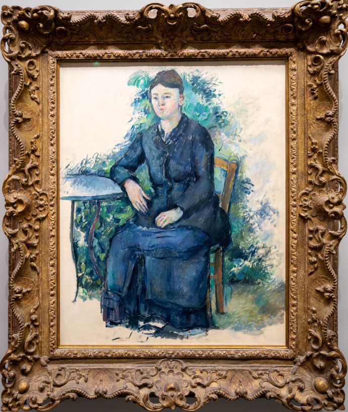 Madame Cézanne in the Garden- Paul Cézanne